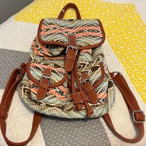 Patterned Backpack with Brown Accents